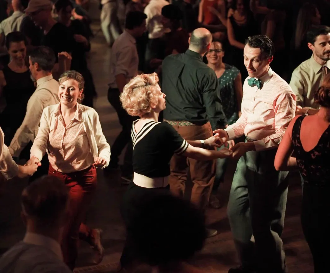 Dancers on a crowded social dance floor
